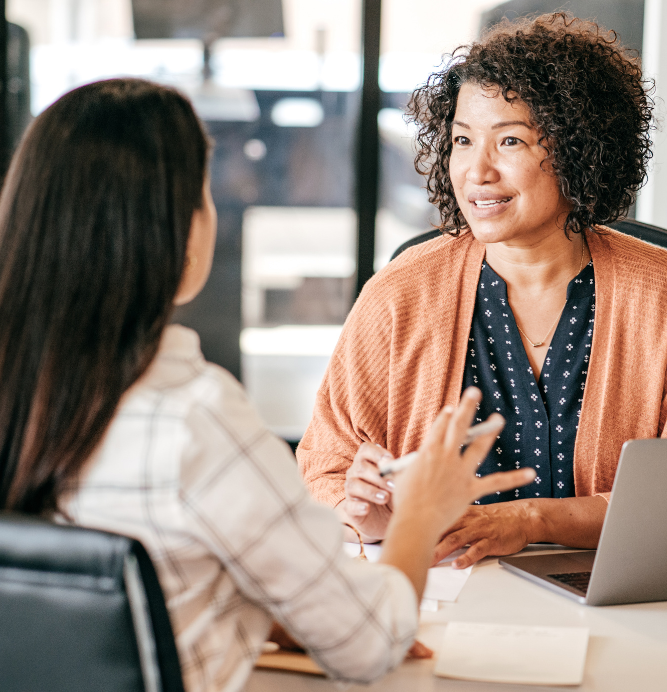 Two women speaking