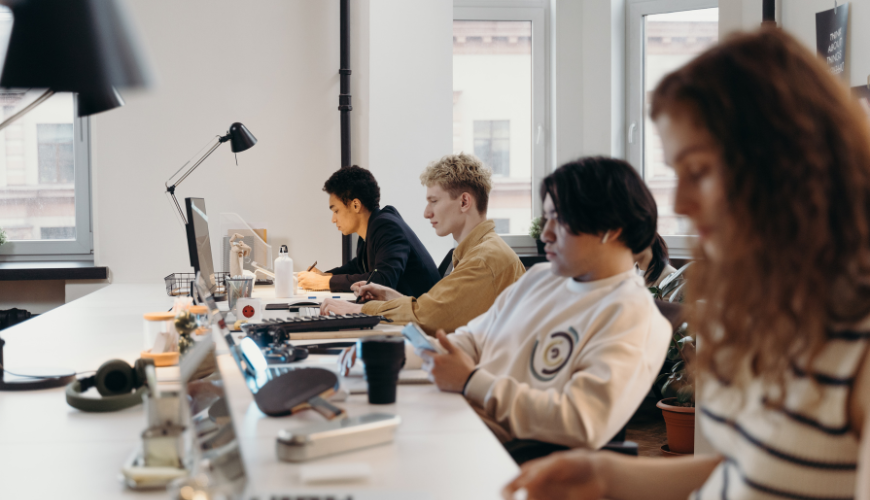 Four people in shared office